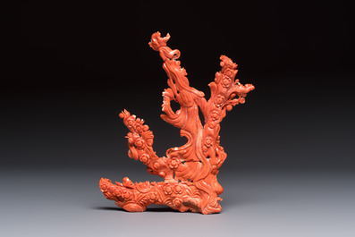 A Chinese carved red coral 'Goddess and Boy' group, 19/20th C.