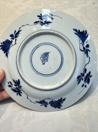 A pair of Chinese blue and white 'Sense of Smell' saucer dishes, artemisia leaf mark, Kangxi