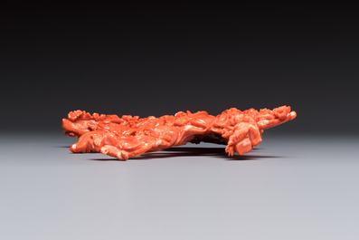 A Chinese carved red coral 'Goddess and Boy' group, 19/20th C.