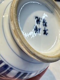 A Chinese blue and white covered vase and two bottle vases, Chenghua and jade marks, Kangxi