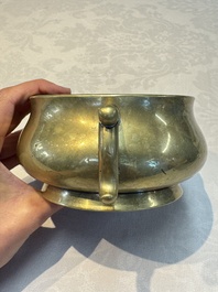 A Chinese bronze handled censer and stand, 17/18th C.