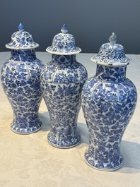 A Chinese blue and white five-piece garniture with floral design, Kangxi