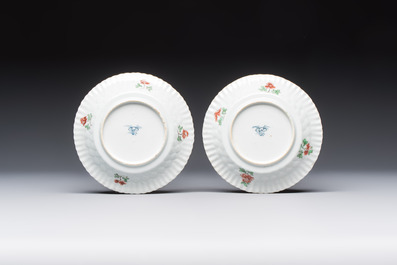 Seven Chinese famille verte cups and four saucers, conch shell and lingzhi marks, Kangxi