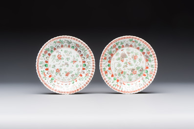 Seven Chinese famille verte cups and four saucers, conch shell and lingzhi marks, Kangxi