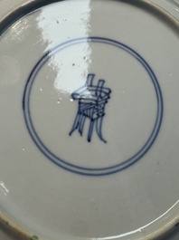 A Chinese famille verte 'Eight Horses' plate, Kangxi