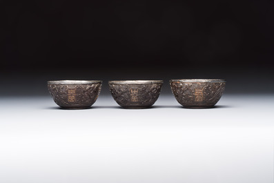 A group of 12 Chinese silver-lined coconut 'Shou 壽' bowls and cups, Wang Hengxin 王恆馨 marks, 19/20th C.