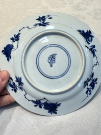 A pair of Chinese blue and white 'Sense of Smell' saucer dishes, artemisia leaf mark, Kangxi