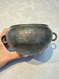 A Chinese archaic bronze two-handled cup with 'Leiwen' design, late Spring and Autumn period