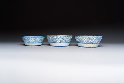 Six Chinese blue and white reticulated baskets with pagodas along a river, Qianlong