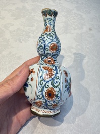Three polychrome Dutch Delft cashmere palette bottle vases, first quarter 18th C.