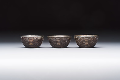 A group of 12 Chinese silver-lined coconut 'Shou 壽' bowls and cups, Wang Hengxin 王恆馨 marks, 19/20th C.