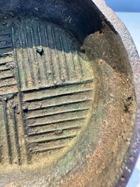A miniature Chinese archaic bronze wine vessel with Taotie handles, 'Hu 壺', Han