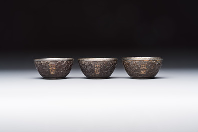 A group of 12 Chinese silver-lined coconut 'Shou 壽' bowls and cups, Wang Hengxin 王恆馨 marks, 19/20th C.