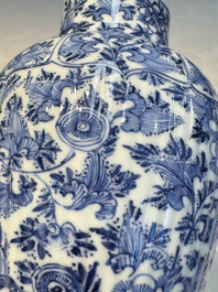 A Chinese blue and white five-piece garniture with floral design, Kangxi