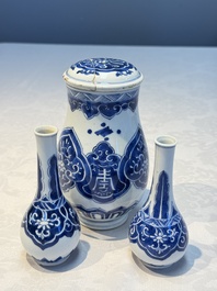 A Chinese blue and white covered vase and two bottle vases, Chenghua and jade marks, Kangxi