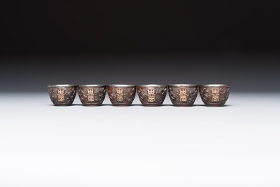 A group of 12 Chinese silver-lined coconut 'Shou 壽' bowls and cups, Wang Hengxin 王恆馨 marks, 19/20th C.