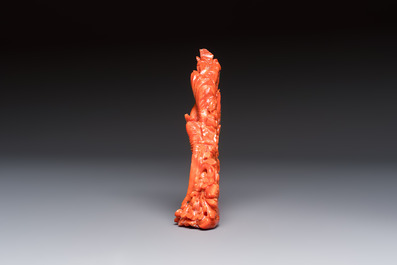 A Chinese carved red coral 'Birds and Flowers' group on a wooden stand, 19/20th C.