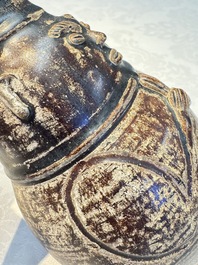 Three khmer-style brown-glazed anthropomorphic gourd-form bottles, probably 12/13th C.
