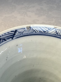 A Chinese blue and white five-piece garniture with floral design, Kangxi
