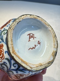 Three polychrome Dutch Delft cashmere palette bottle vases, first quarter 18th C.