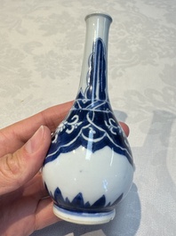 A Chinese blue and white covered vase and two bottle vases, Chenghua and jade marks, Kangxi