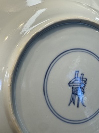 A Chinese famille verte 'Eight Horses' plate, Kangxi