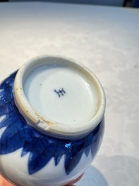 A Chinese blue and white covered vase and two bottle vases, Chenghua and jade marks, Kangxi