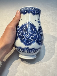 A Chinese blue and white covered vase and two bottle vases, Chenghua and jade marks, Kangxi