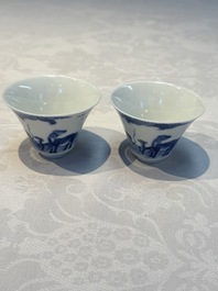 A pair of Chinese blue and white 'Bleu de Hue' cups with zodiac animals, Noi Phu 內府 mark, 19th C.