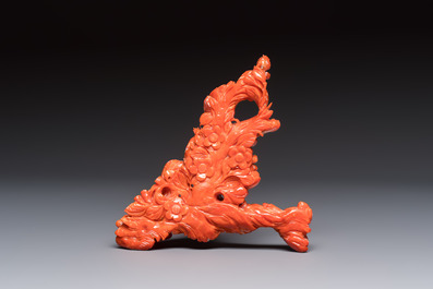 A Chinese carved red coral 'Birds and Flowers' group on a wooden stand, 19/20th C.