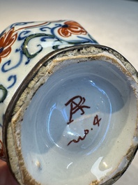 Three polychrome Dutch Delft cashmere palette bottle vases, first quarter 18th C.