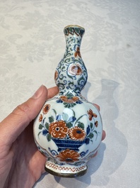 Three polychrome Dutch Delft cashmere palette bottle vases, first quarter 18th C.