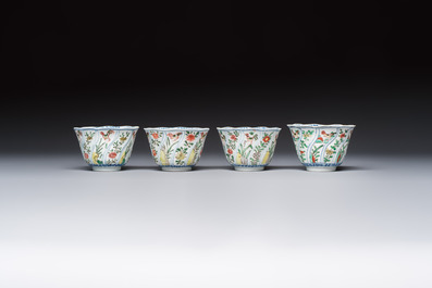 Seven Chinese famille verte cups and four saucers, conch shell and lingzhi marks, Kangxi