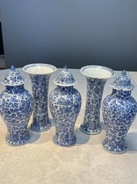 A Chinese blue and white five-piece garniture with floral design, Kangxi