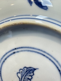 A pair of Chinese blue and white 'Sense of Smell' saucer dishes, artemisia leaf mark, Kangxi
