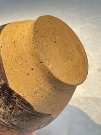 Three khmer-style brown-glazed anthropomorphic gourd-form bottles, probably 12/13th C.