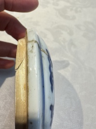 A Chinese blue and white covered vase and two bottle vases, Chenghua and jade marks, Kangxi