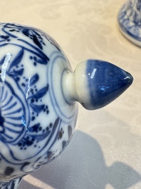 A Chinese blue and white five-piece garniture with floral design, Kangxi