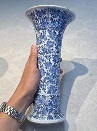 A Chinese blue and white five-piece garniture with floral design, Kangxi