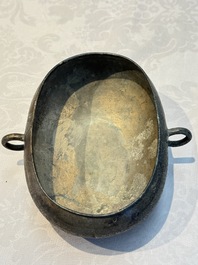 A Chinese archaic bronze two-handled cup with 'Leiwen' design, late Spring and Autumn period