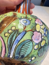 A pair of clobbered Dutch Delft vases, 17th C.