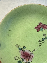 Four Chinese famille rose saucers and a gilt-decorated powder-blue-ground saucer, Qianlong and Jiaqing marks, 18/19th C.