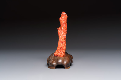 A Chinese carved red coral 'Birds and Flowers' group on a wooden stand, 19/20th C.