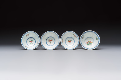 Seven Chinese famille verte cups and four saucers, conch shell and lingzhi marks, Kangxi