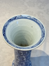 A Chinese blue and white five-piece garniture with floral design, Kangxi