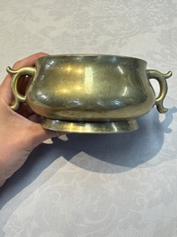 A Chinese bronze handled censer and stand, 17/18th C.