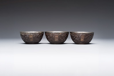 A group of 12 Chinese silver-lined coconut 'Shou 壽' bowls and cups, Wang Hengxin 王恆馨 marks, 19/20th C.