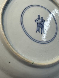 A Chinese famille verte 'Eight Horses' plate, Kangxi