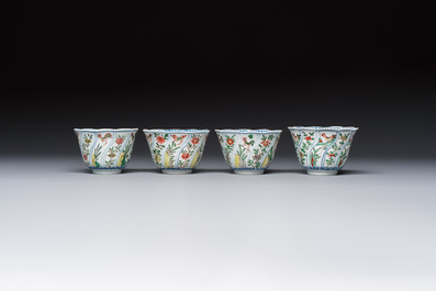 Seven Chinese famille verte cups and four saucers, conch shell and lingzhi marks, Kangxi