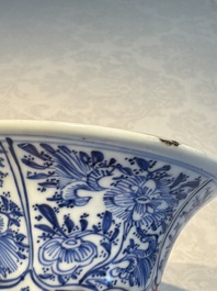 A Chinese blue and white five-piece garniture with floral design, Kangxi